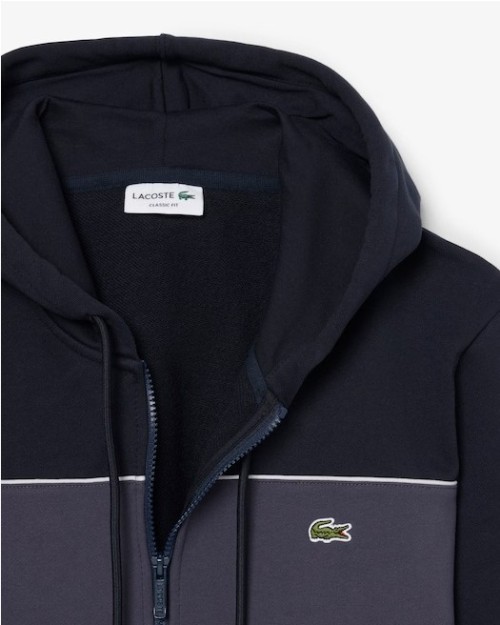 SUDADERA CON CAPUCHA Y CREMALLERA.