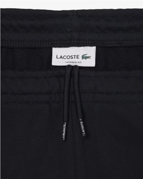 PANTALÓN CHANDAL CORTE TAPERED.